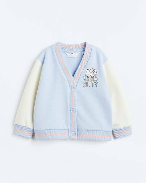 IMAGE 2026-02-18 11:24:44 Cardigan fille bleu pastel H&M Hello Kitty 4-10 ans - Image 1
